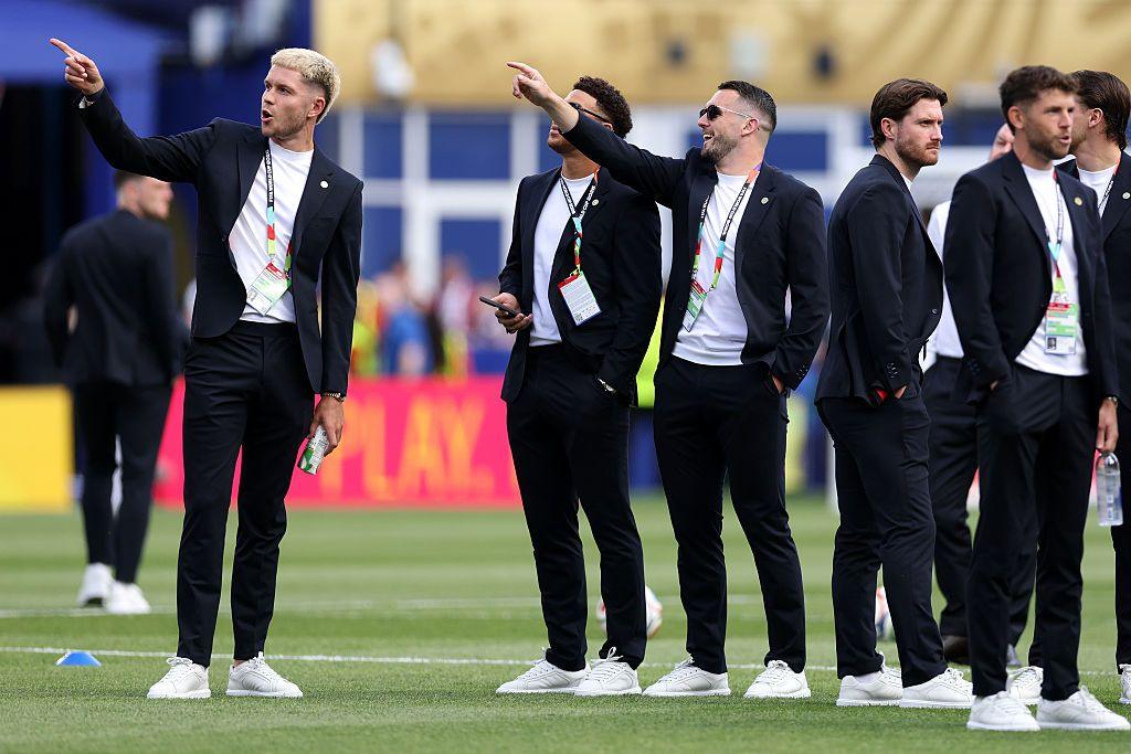 The Scotland team, suited but not booted, take a gander at their home away from home in Boston