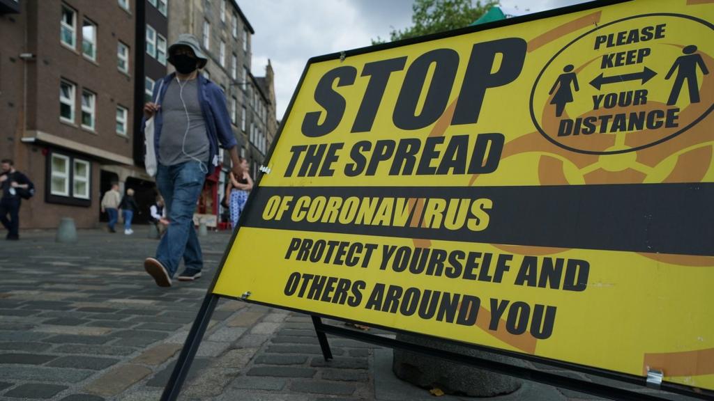 Stop the spread sign