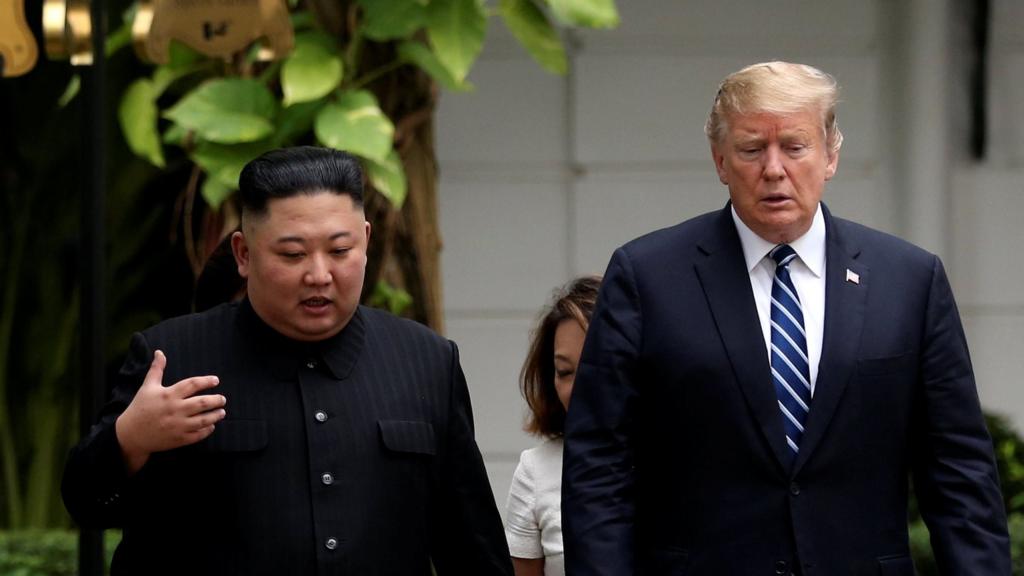 North Korea"s leader Kim Jong Un and U.S. President Donald Trump talk in the garden of the Metropole hotel during the second North Korea-U.S. summit in Hanoi