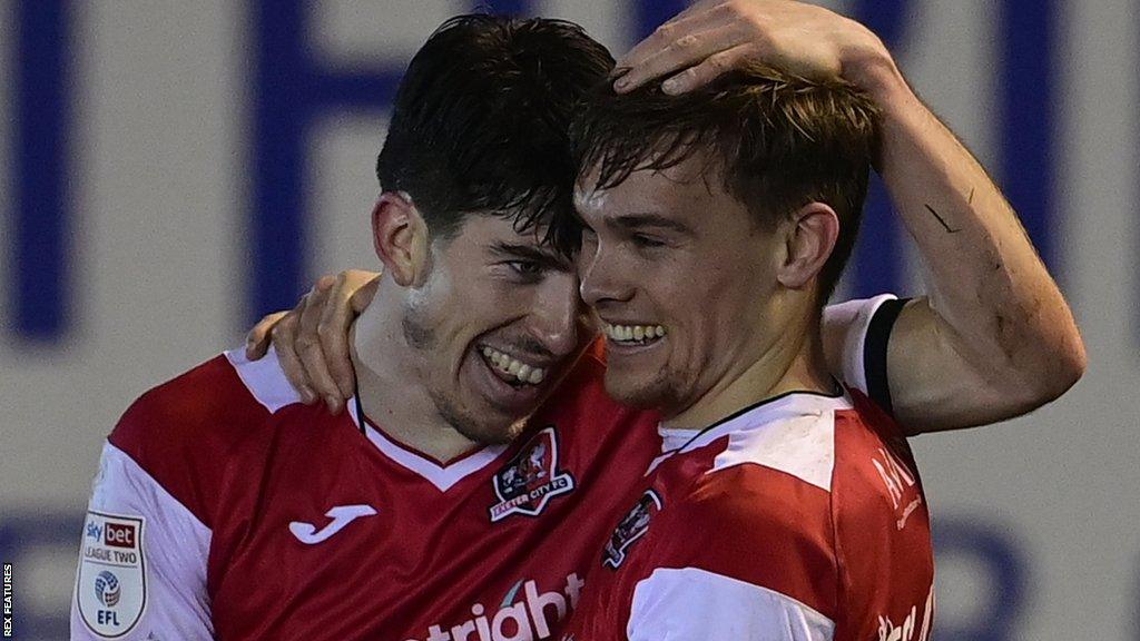 Josh Key (left) and Archie Collins celebrate a goal