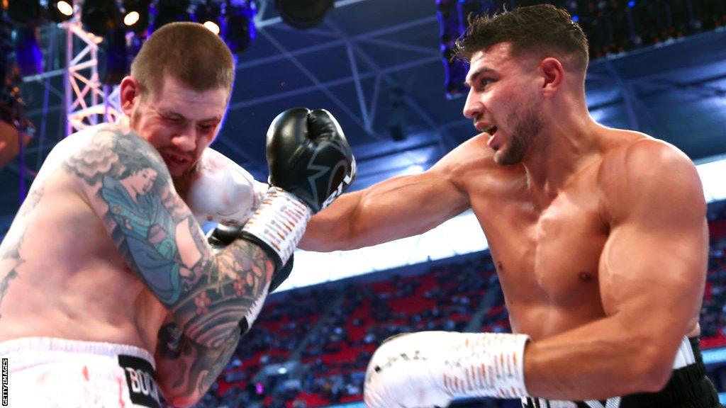 Tommy Fury throws a punch against Daniel Bocianski at Wembley in April 2022