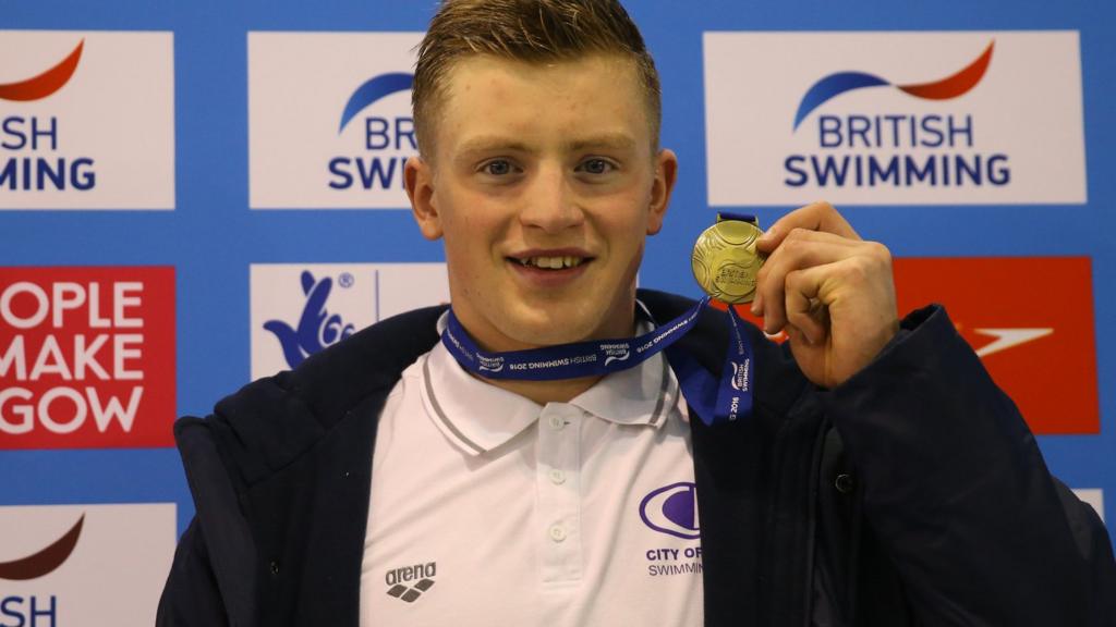 Adam Peaty with gold medal