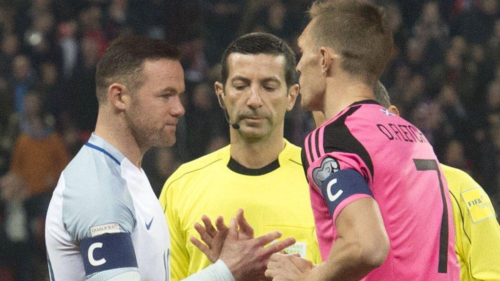 England captain Wayne Rooney and Scotland counterpart Darren Fletcher