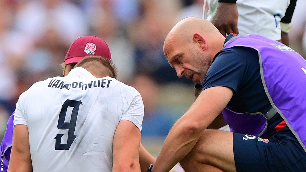 Jack van Poortvliet is treated on the field in England's 19-17 win over Wales at Twickenham