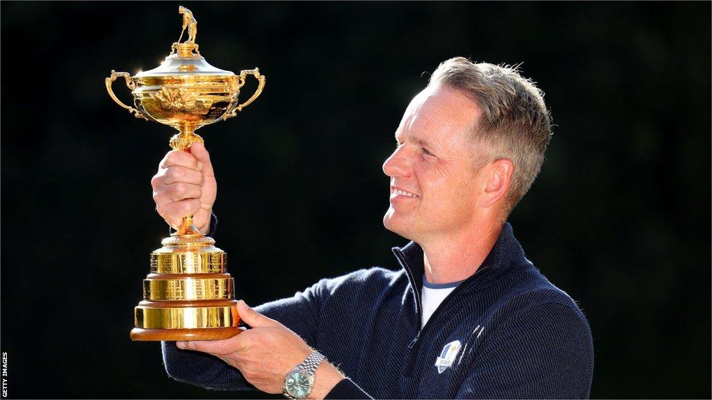 Europe captain Luke Donald lifts the Ryder Cup