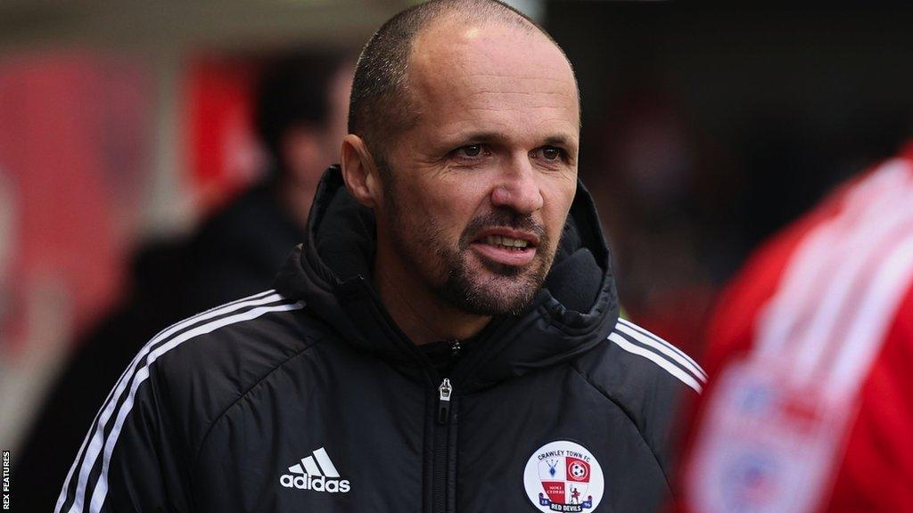 Matthew Etherington in the Crawley dugout