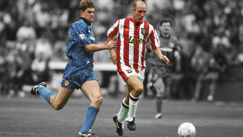 Alan Cork outpaces Gary Pallister of Manchester United