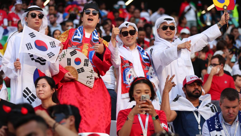 Korea fans pose during the FIFA World Cup Qatar 2022