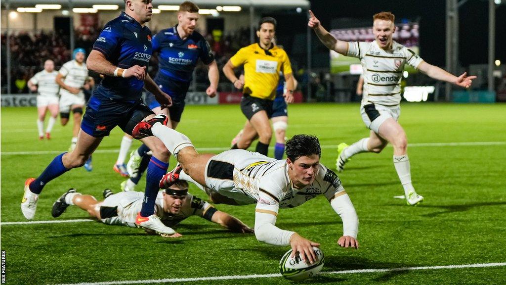 Louis Rees-Zammit dives over the line to score a try for Gloucester against Edinburgh