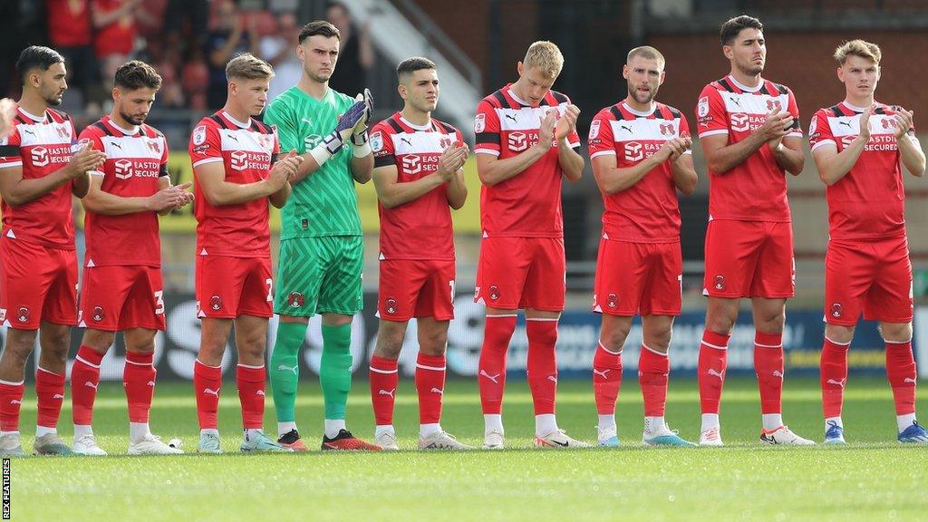 Leyton Orient players applaud