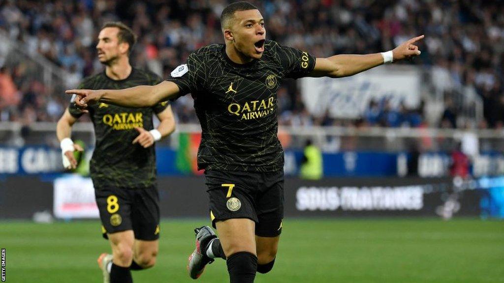 Kylian Mbappe celebrates after scoring for Paris St-Germain against Auxerre