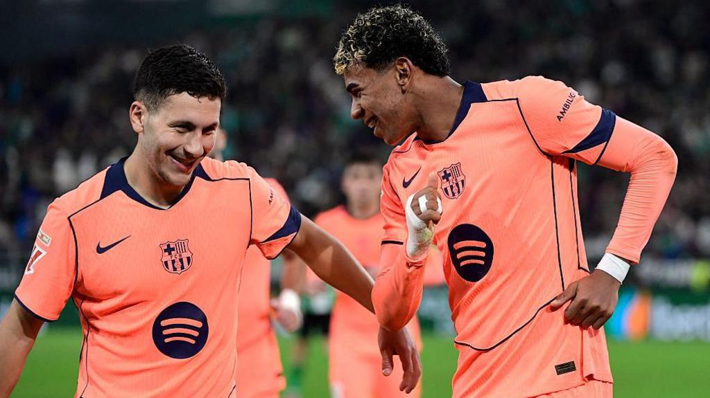 Roony Bardghji (left) celebrating with Lamine Yamal (right) in the win at Real Betis