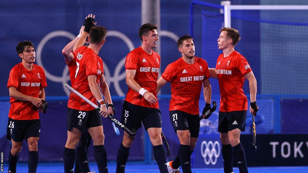 Team GB men playing hockey at Tokyo 2020 Olympics