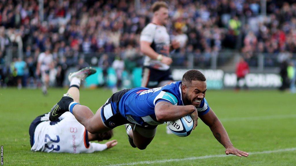 Ollie Lawrence scores a try for Bath against Saracens