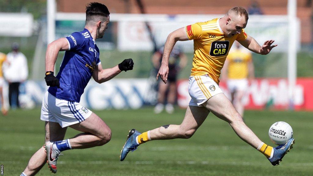 Antrim's Marc Jordan and Cavan's Gerard Smith were in action at Corrigan Park