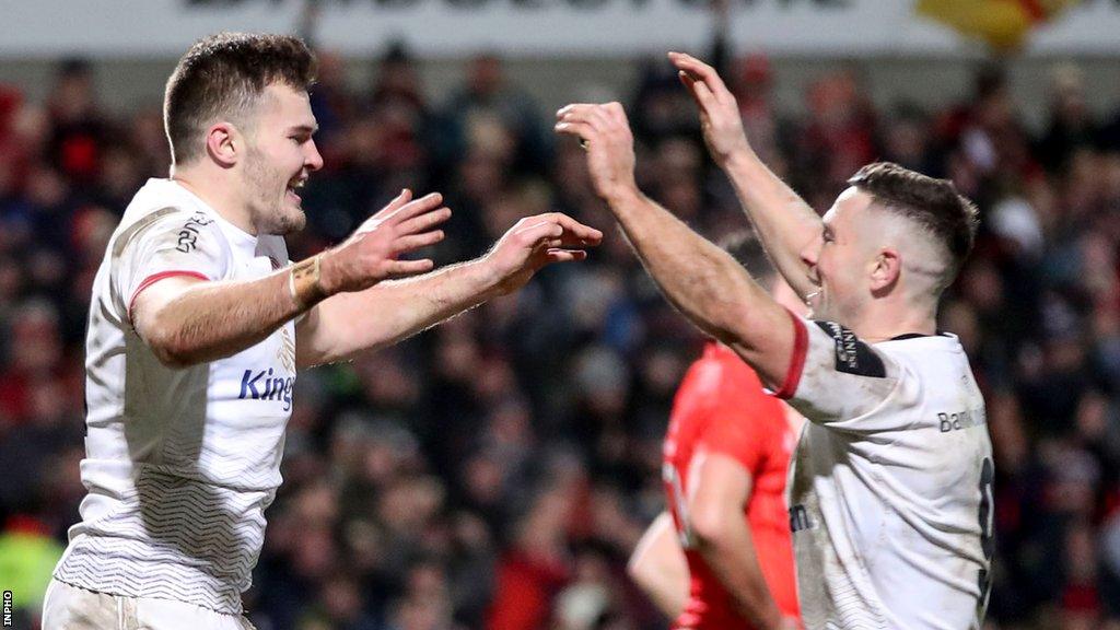 Jacob Stockdale celebrates scoring a try for Ulster with John Cooney