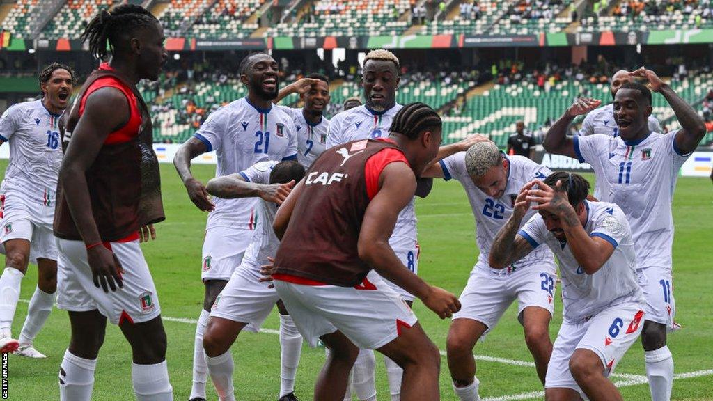 Equatorial Guinea's midfielder Iban Edu celebrates with teammates after scoring his team's first goal during the Africa Cup of Nations (CAN) 2024 group A football match between Nigeria and Equatorial Guinea