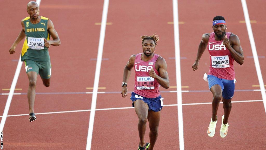 Luxolo Adams (left) and Noah Lyles (centre)