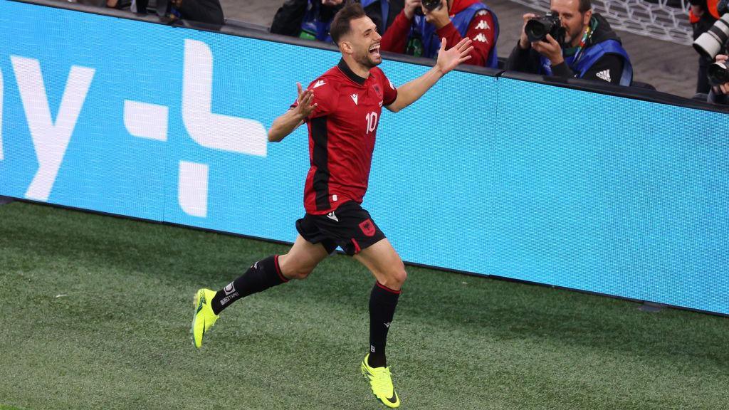 Nedim Bajrami celebrates scoring against Italy