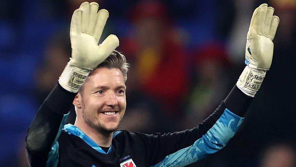 Wayne Hennessey raises his arms and smiles