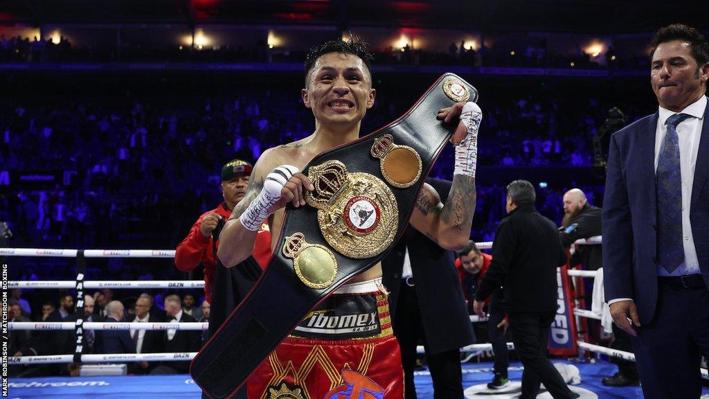 Mauricio Lara holds the belt