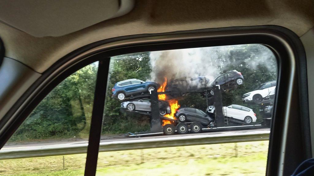 A picture showing the fire, taken from a car