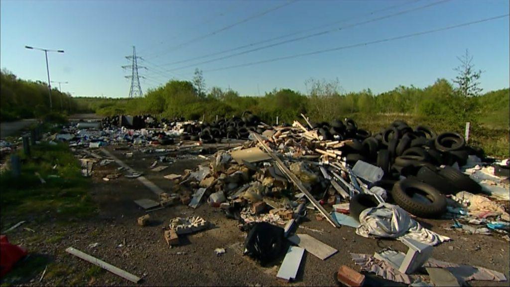 A Newport road filled with rubbish