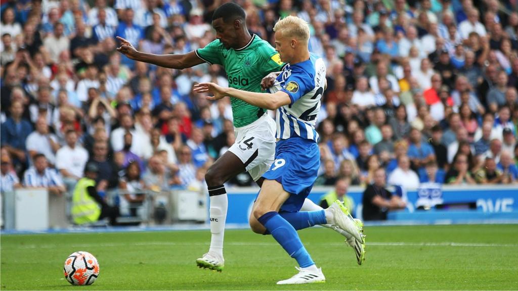 Newcastle's Alexander Isak (centre-left) and Jan Paul van Hecke of Brighton (centre-right)