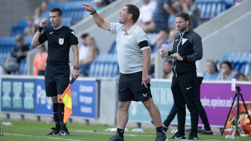 Clough shouting on the side-lines against Colchester United.