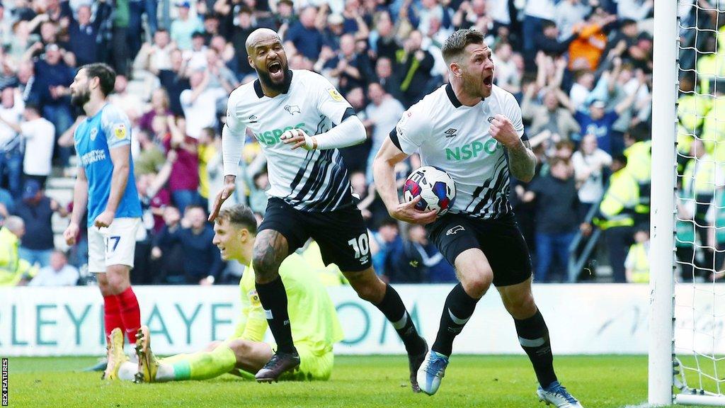 James Collins celebrates his equaliser for Derby against Portsmouth