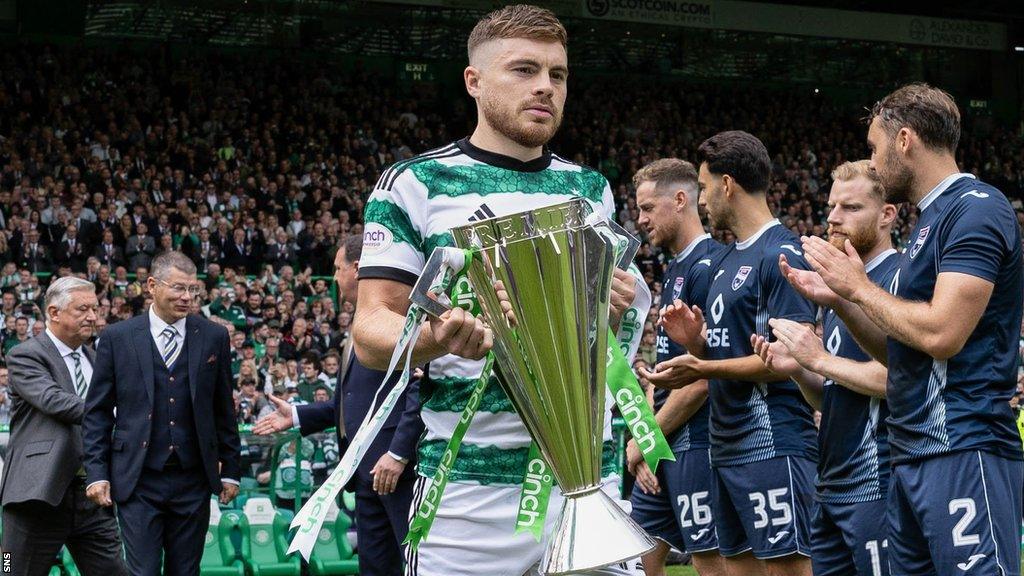 Celtic winger James Forrest with the Scottish Premiership trophy