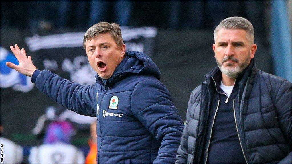 Blackburn Rovers manager Jon Dahl Tomasson and Preston North End boss Ryan Lowe on the touchline