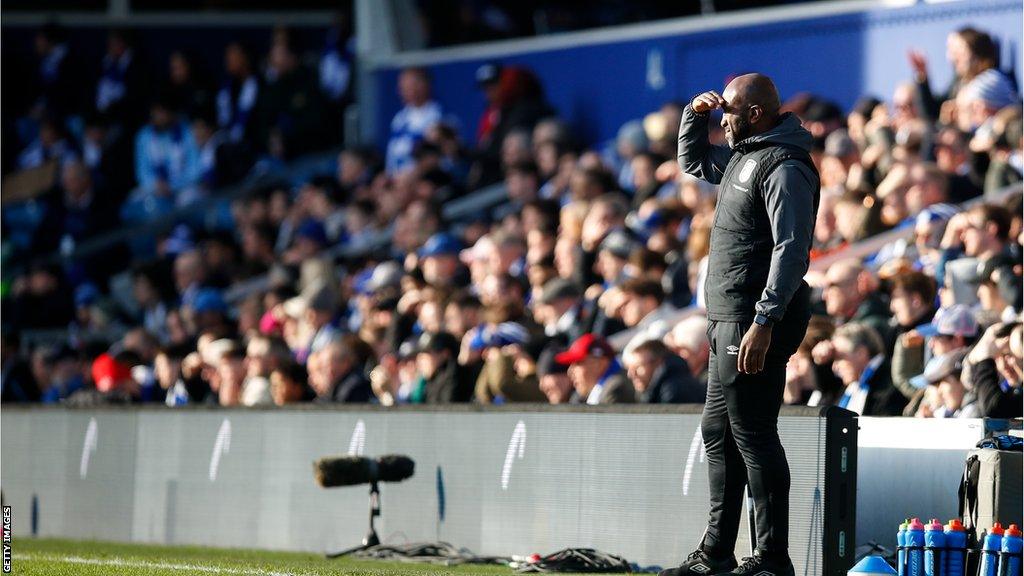 Darren Moore on the sidelines during Queens Park Rangers v Huddersfield Town in January