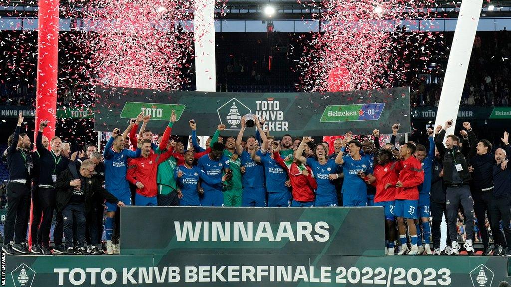 The PSV Eindhoven squad lifting the Dutch Cup