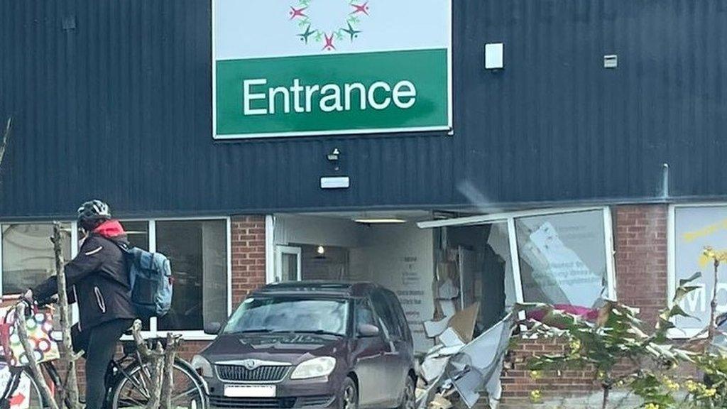 Car crashed into the front entrance of a charity shop