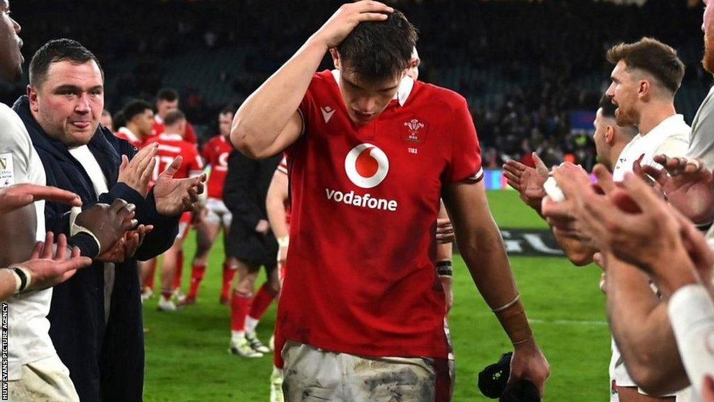 Dafydd Jenkins walks off dejected against England at Twickenham