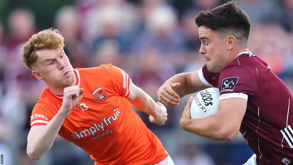 Galway's Sean Kelly tries to burst past Armagh's Conor Turbitt