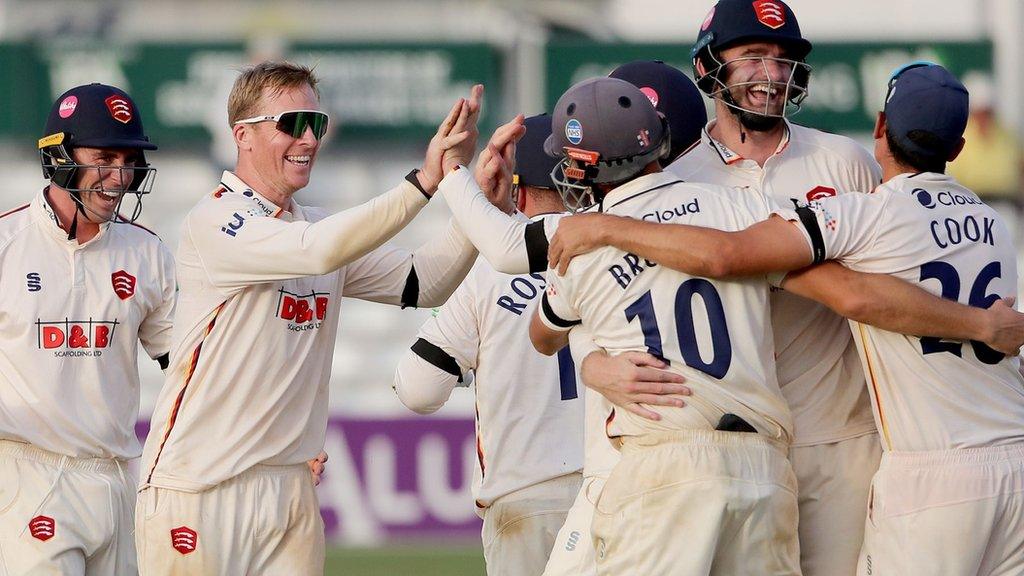 Essex celebrated their sixth successive win to keep well within range of Surrey