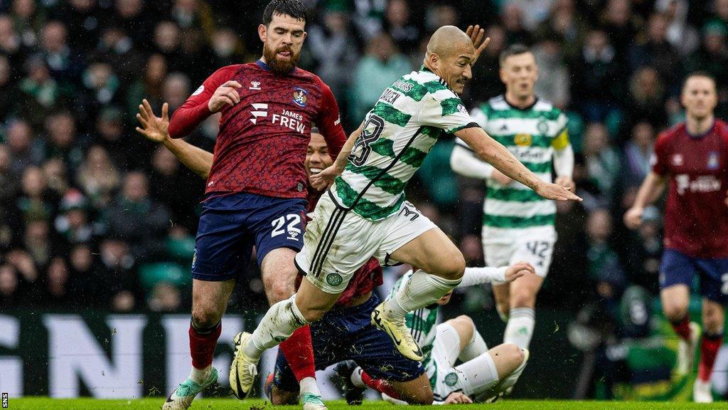 Kilmarnock's Liam Donnelly and Celtic's Daizen Maeda