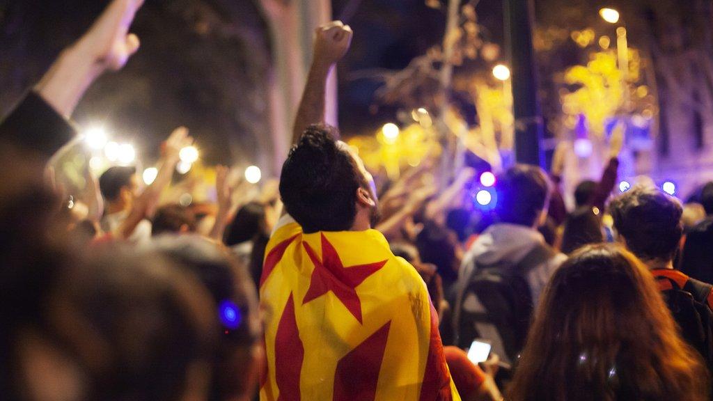 A protester shouting outside the Catalan justice court., during a demonstration in Barcelona