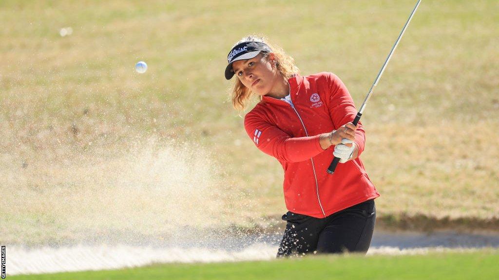 Jess Baker playing a shot out of a bunker