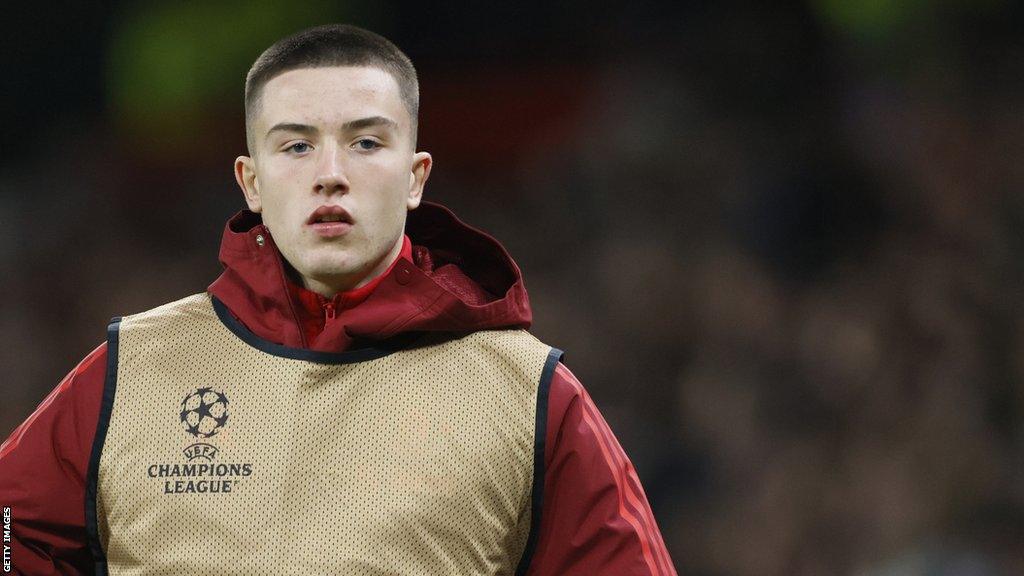 Manchester United's Dan Gore warming up before a Champions League game