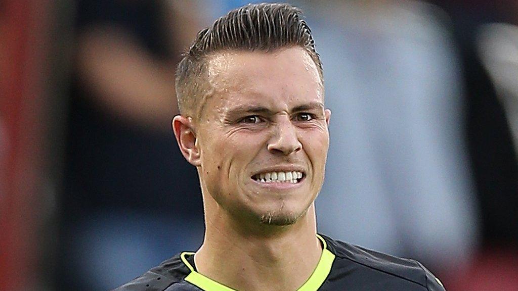 Bristol Rovers striker Billy Bodin grimaces as he receives treatment for an injury picked up against Northampton Town