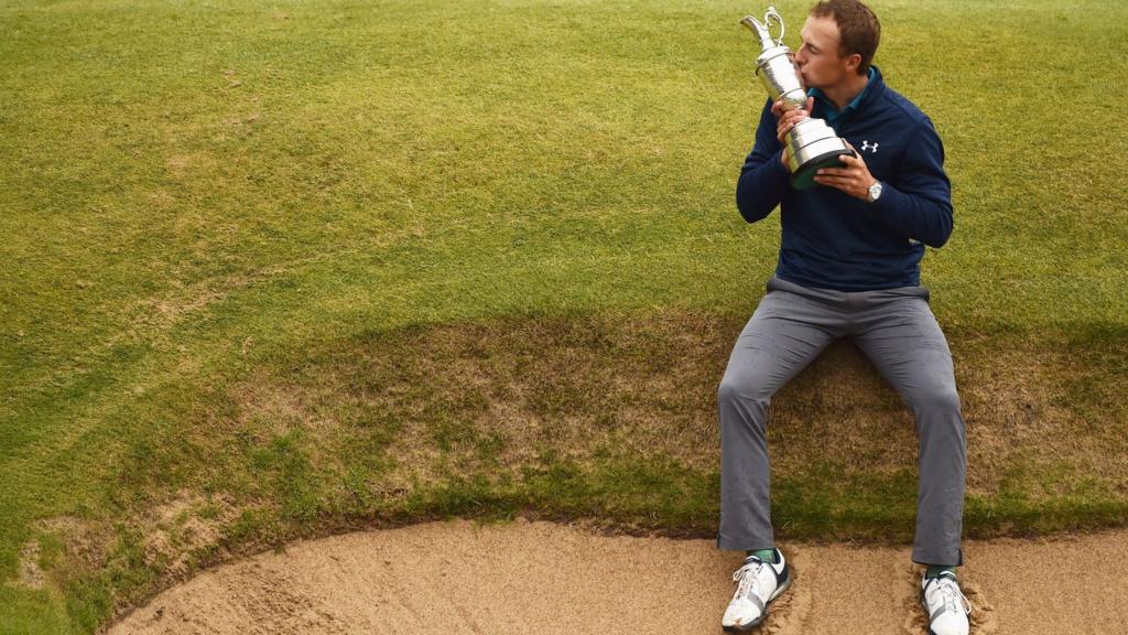 Jordan Spieth of the United States kisses the Claret Jug