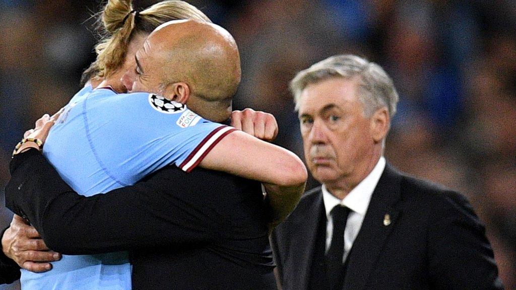 Pep Guardiola embraces Erling Haaland