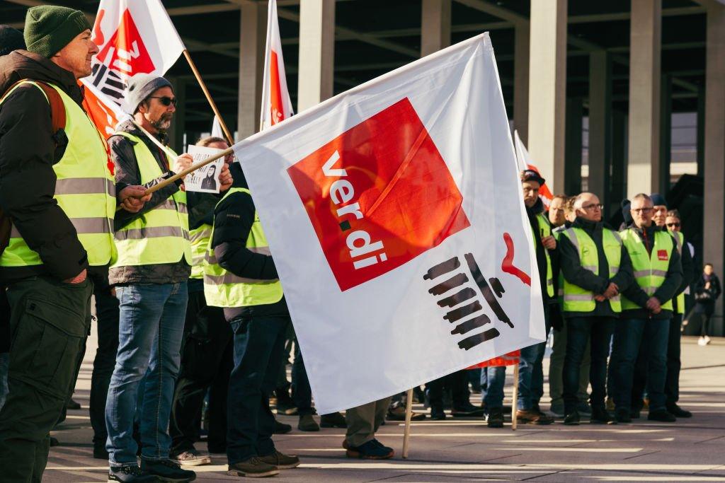 Workers demonstrate during a strike organised by the Ver.di union, at Berlin Brandenburg Airport, in Berlin, Germany, on Thursday, March 7, 2024