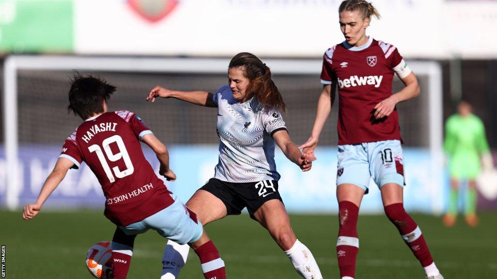 Liverpool's Katie Stengel looks to get past West Ham's Honoka Hayashi