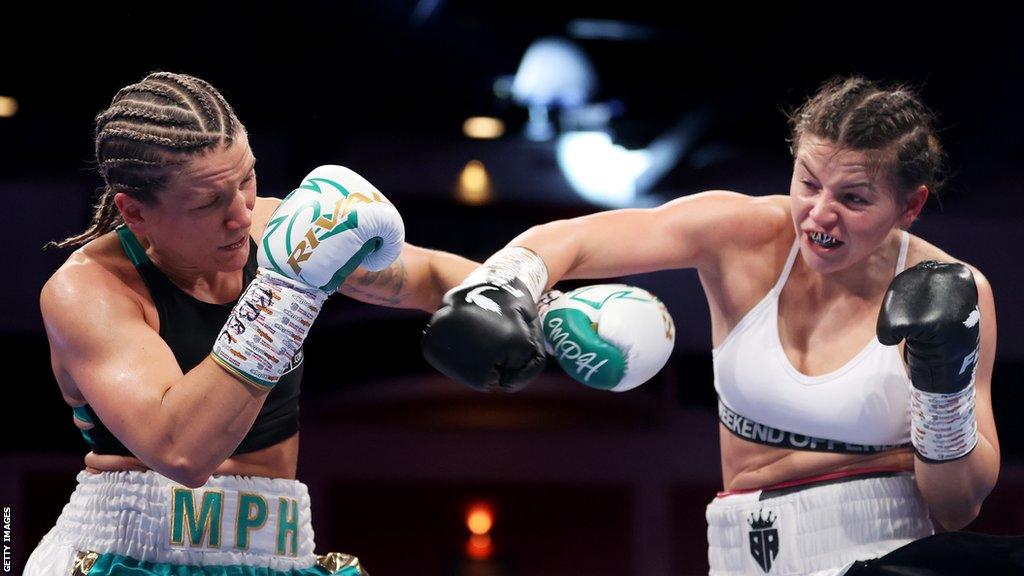 Sandy Ryan (right) punching Marie Piere Houle