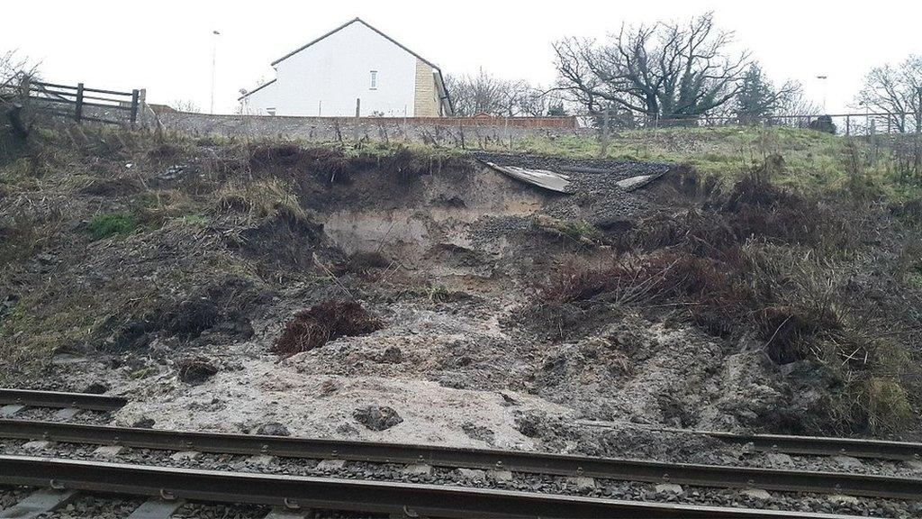 Engineers work to clear rubble from the landslide near Hexham