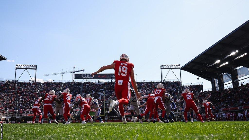 Whelan punts against the St Louis Battlehawks